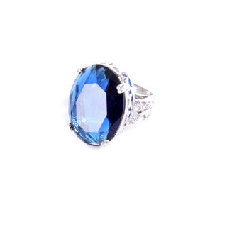Silver colored ring encrusted with navy stone and small Zircon stones -1295