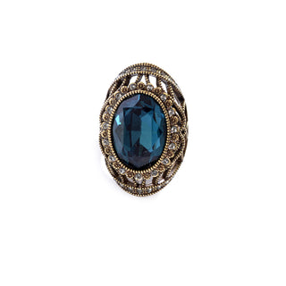 Bronze colored ring encrusted with dark blue stone and small Zircon stones -1293